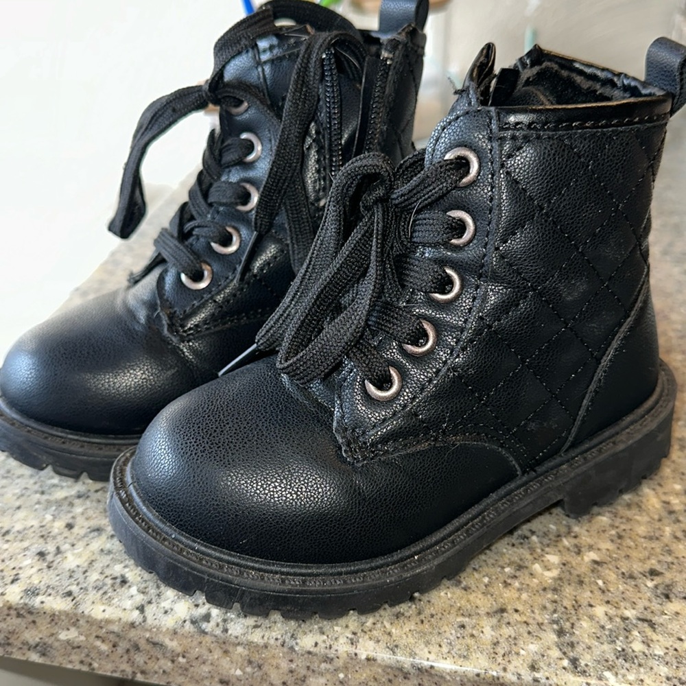 Black “biker” boots. Child’s size 10.